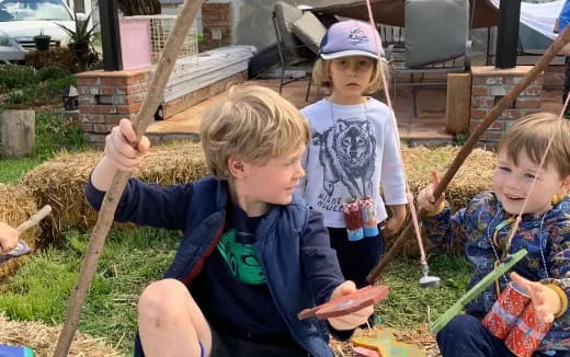 a group of children playing outside