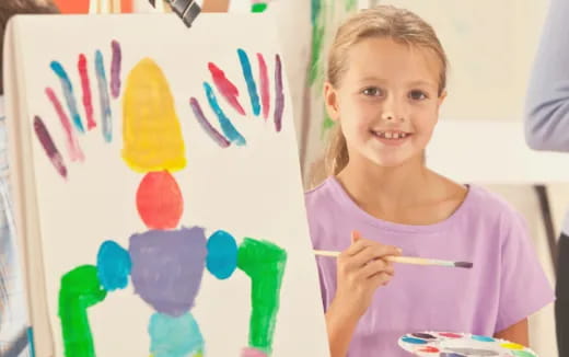 a child holding a fork