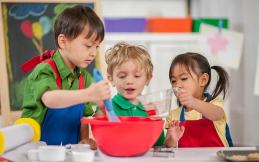 a group of children eating