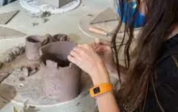 a person washing a cat