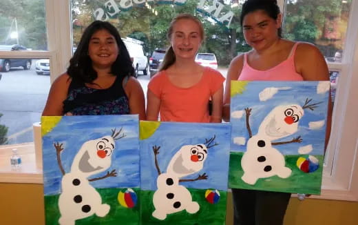 a group of women posing for a picture