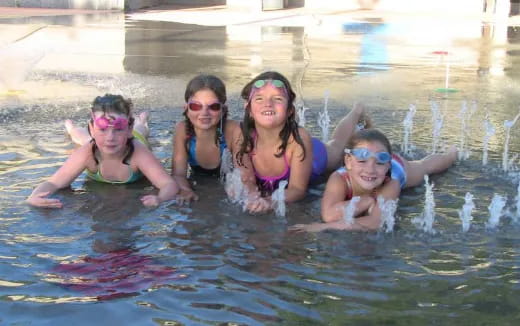 a group of people in a pool