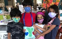 a group of people wearing face masks