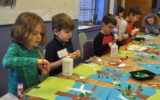 a group of children playing a board game