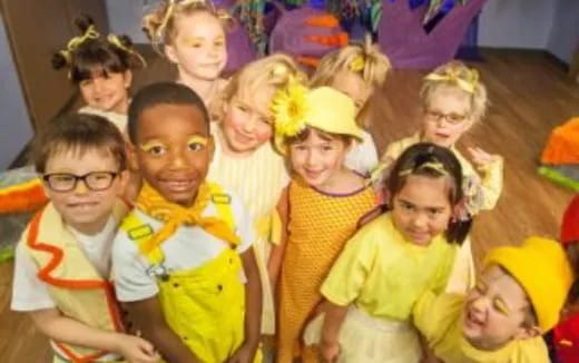 a group of children posing for a photo
