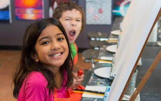 a couple of girls posing for the camera