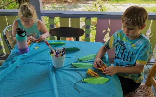 a couple of kids painting