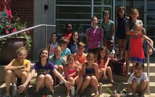 a group of people posing for a photo