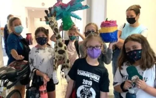 a group of people wearing masks