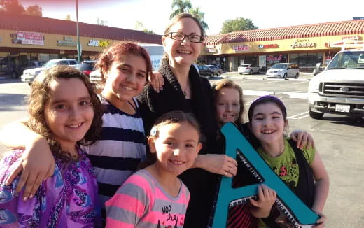 a group of people posing for a photo