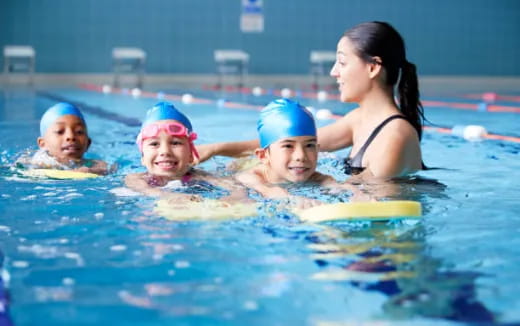 a group of people in a pool