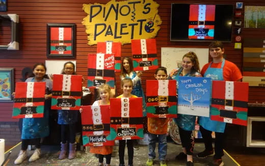 a group of people holding signs