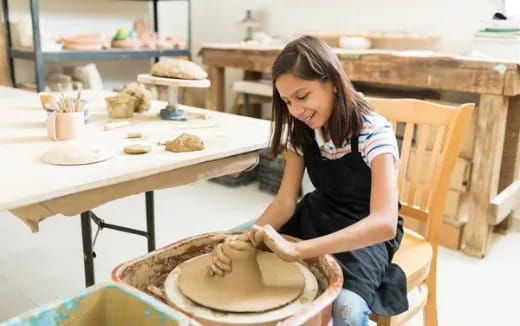 a woman making a cake