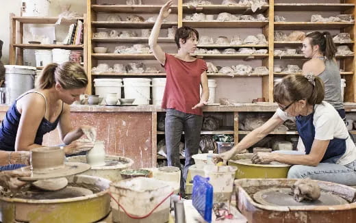 a group of women working in a kitchen