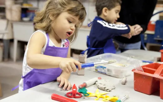 a young girl painting