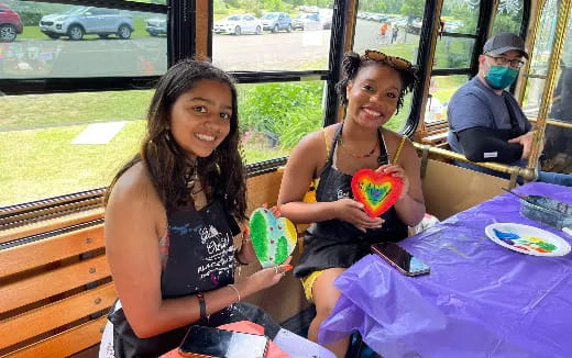 two women sitting at a table