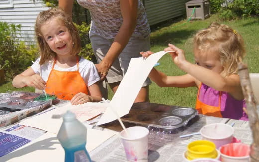 a person and a girl painting