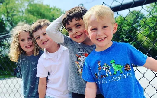 a group of children posing for a photo