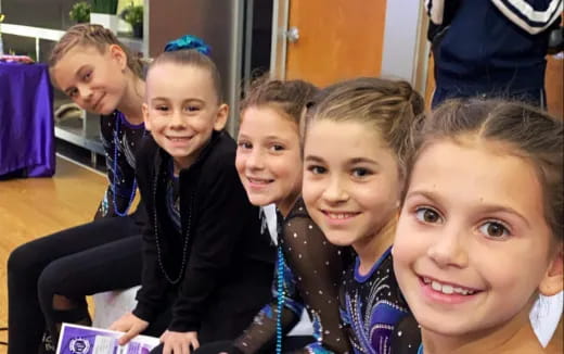 a group of children smiling