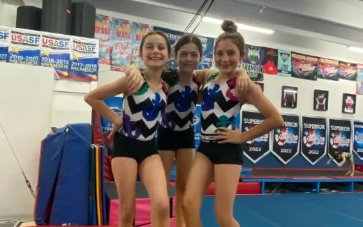 a group of women in athletic uniforms