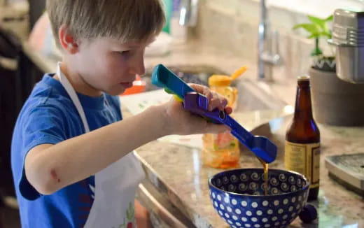 a young boy painting