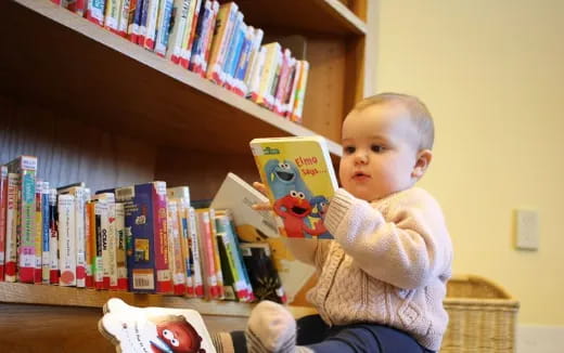 a baby sitting on a table