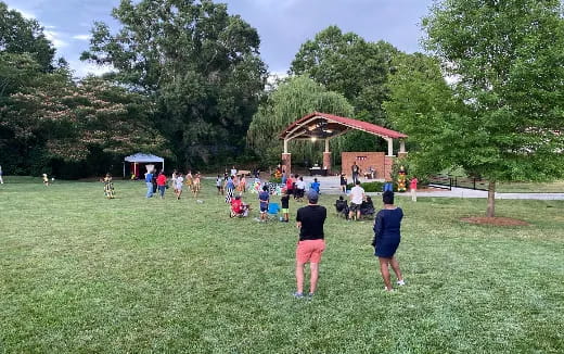 a group of people in a park