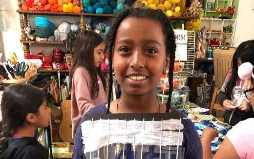 a woman smiling at the camera