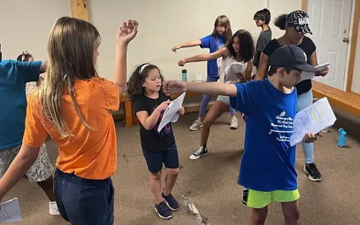 a group of children in a room