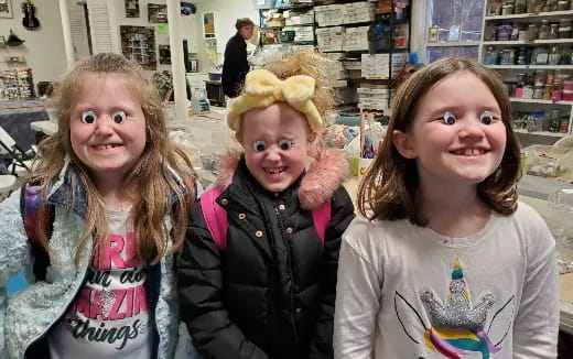 a group of girls posing for a photo