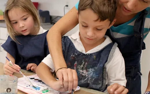 a few children doing a science experiment