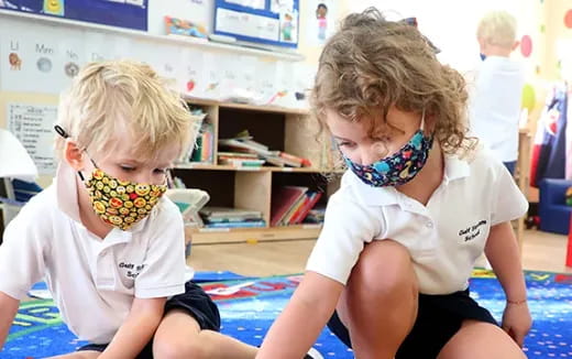 a few young children wearing safety goggles