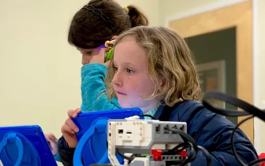 a person looking at a child