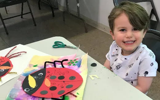 a child sitting at a table