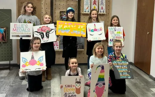 a group of people holding signs