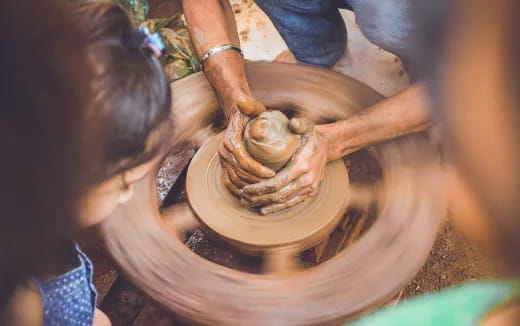 a person holding a bucket