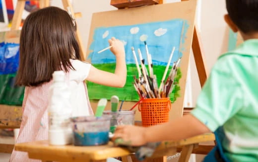 a young girl painting