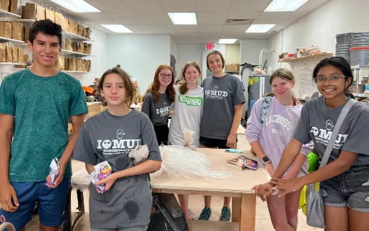 a group of people posing for a photo