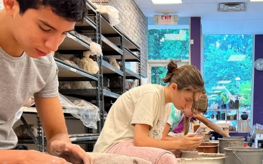 a man and a woman in a kitchen