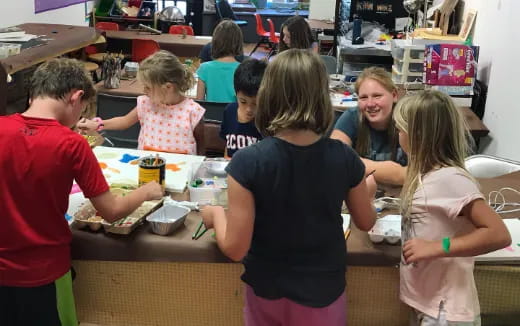 a group of children in a classroom