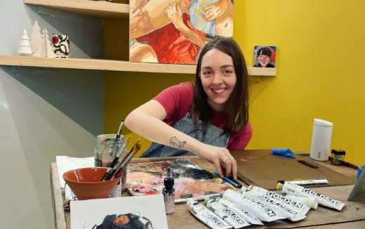a woman sitting at a table