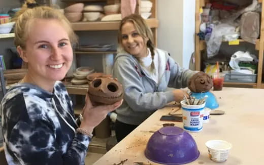 a person holding a cookie
