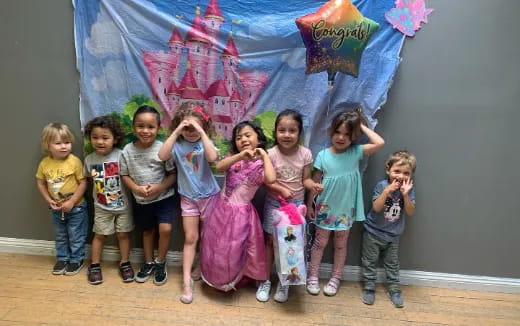 a group of children posing for a photo