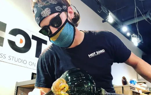 a man wearing a mask and goggles