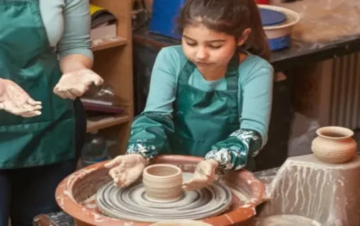 a person making a cupcake