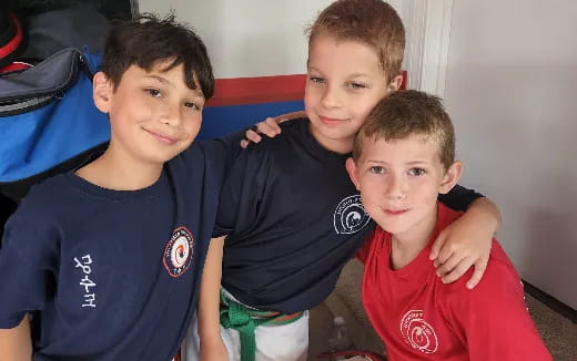 a group of boys posing for a picture