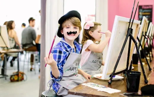 a couple of girls wearing clothing