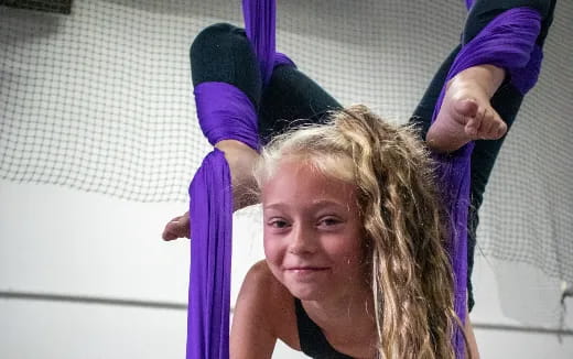 a woman with her hair pulled back