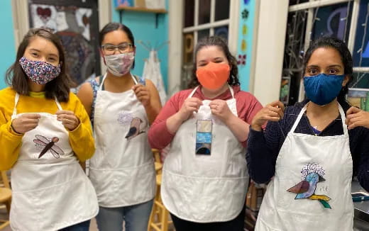 a group of people wearing face masks