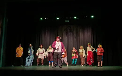 a group of people on a stage